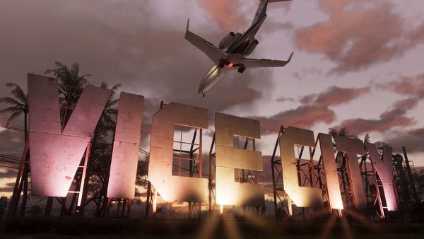 The Vice City sign at sunset with a plane flying overhead